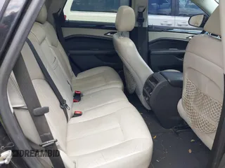 2013 Cadillac SRX Performance Collection z VIN 3GYFNDE35DS555248, wystawiony jako IAAI lot #42001494 z przebiegiem 268 410 mil mil oraz . Historia ofert i sprzedaży dostępna na DreamBid. Obrazek 8.