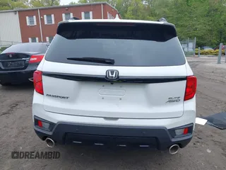2023 Honda Passport Elite with VIN 5FNYF8H00PB022743, listed as a IAAI auction lot 42192958 with 25,165 mi miles and . Bid and sale history available at DreamBid. Image 16.