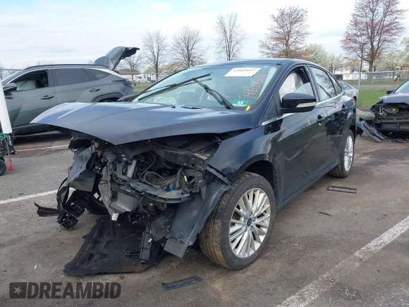2018 Ford Focus Titanium с VIN 1FADP3J2XJL294107, выставлен на аукционе IAAI как лот 42005814 с пробегом 93 239 миль миль и . История ставок и продаж доступна на DreamBid. Изображение 2.