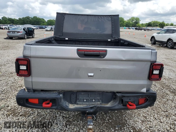 2020 Jeep Gladiator Rubicon z VIN 1C6JJTBG7LL102712, wystawiony jako Copart lot #60887965 z przebiegiem 80 262 mil mil oraz Szkoda całkowita • Salvage title. Historia ofert i sprzedaży dostępna na DreamBid. Obrazek 6.