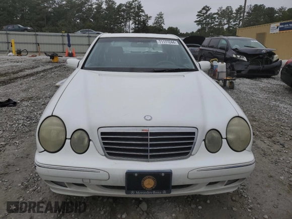 2000 Mercedes-Benz E-Class with VIN WDBJF70J1YB078418, listed as a Copart auction lot 71177244 with 189,838 mi miles and Salvage Title. Bid and sale history available at carsss.com. Image 5.