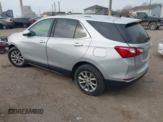 2018 Chevrolet Equinox LT z VIN 2GNAXJEV2J6202865, wystawiony jako IAAI lot #42029667 z przebiegiem 87 792 mil mil oraz . Historia ofert i sprzedaży dostępna na DreamBid. Obrazek 3.