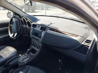 2010 Chrysler Sebring Limited with VIN 1C3CC5FB1AN203515, listed as a IAAI auction lot 42063786 with 171,035 mi miles and . Bid and sale history available at DreamBid. Image 5.