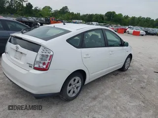 2006 Toyota Prius with VIN JTDKB20U567529834, listed as a IAAI auction lot 42119723 with 209,638 mi miles. Bid and sale history available at carsss.com. Image 4.