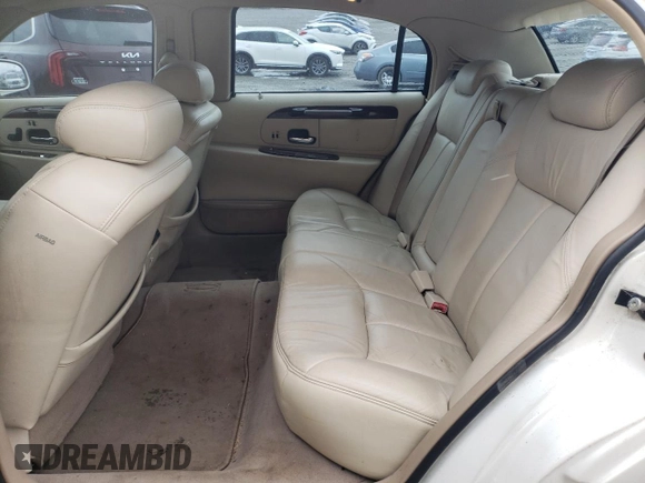 2001 Lincoln Town Car Cartier L z VIN 1LNHM85W11Y610538, wystawiony jako Copart lot #47881055 z przebiegiem 139 032 mil mil oraz Szkoda całkowita • Salvage title. Historia ofert i sprzedaży dostępna na DreamBid. Obrazek 10.