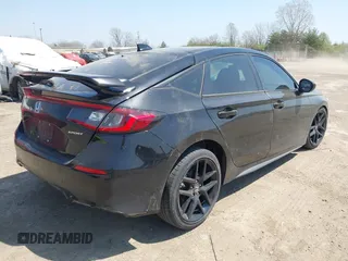 2023 Honda Civic Sport with VIN 19XFL2H86PE019273, listed as a IAAI auction lot 42066031 with 63,817 mi miles and . Bid and sale history available at DreamBid. Image 4.
