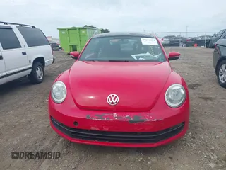 2012 Volkswagen Beetle 2.5L PZEV with VIN 3VWJP7AT2CM665045, listed as a IAAI auction lot 40222839 with 114,624 mi miles. Bid and sale history available at carsss.com. Image 12.
