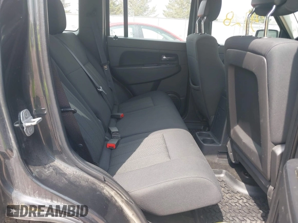2011 Jeep Liberty Sport 70th Anniversary with VIN 1J4PN2GK6BW595515, listed as a IAAI auction lot 42123728 with 313,980 mi miles and . Bid and sale history available at DreamBid. Image 8.
