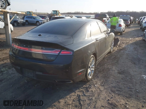 2015 Lincoln MKZ z VIN 3LN6L2J96FR619104, wystawiony jako IAAI lot #41794707 z przebiegiem 140 899 mil mil oraz . Historia ofert i sprzedaży dostępna na DreamBid. Obrazek 4.