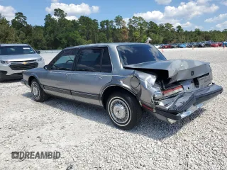 1991 Oldsmobile 88 z VIN 1G3HY54C4MH336805, wystawiony jako Copart lot #73367654 z przebiegiem 168 436 mil mil oraz Szkoda całkowita • Salvage title. Historia ofert i sprzedaży dostępna na DreamBid. Obrazek 2.