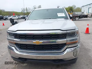 2016 Chevrolet Silverado 1500 LT with VIN 1GCVKREC1GZ228201, listed as a IAAI auction lot 42136420 with 112,101 mi miles and . Bid and sale history available at DreamBid. Image 12.