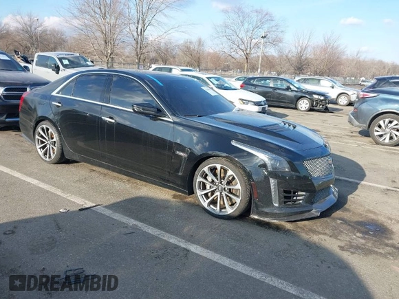 2016 Cadillac CTS-V z VIN 1G6A15S69G0148435, wystawiony jako IAAI lot #41306543 z przebiegiem 22 045 mil mil oraz . Historia ofert i sprzedaży dostępna na DreamBid. Obrazek 1.