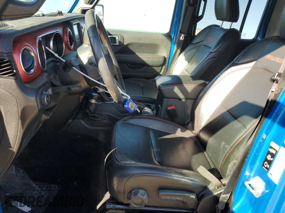 2022 Jeep Wrangler Unlimited Rubicon with VIN 1C4HJXFG5NW217688, listed as a Copart auction lot 81182824 with 63,102 mi miles and Salvage title. Bid and sale history available at DreamBid. Image 7.