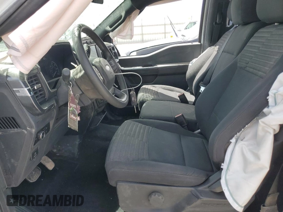 2023 Ford F-150 XL with VIN 1FTEW1EPXPFC20804, listed as a Copart auction lot 56555615 with 60,984 mi miles and Salvage title. Bid and sale history available at DreamBid. Image 7.