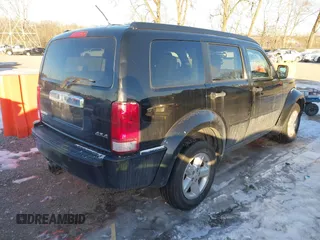 2007 Dodge Nitro SLT with VIN 1D8GU58K27W549214, listed as a IAAI auction lot 41358109 with 99,530 mi miles. Bid and sale history available at carsss.com. Image 4.