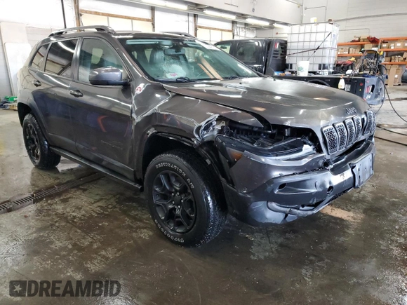 2019 Jeep Cherokee Trailhawk Elite with VIN 1C4PJMBX2KD112355, listed as a Copart auction lot 88948135 with 130,136 mi miles and Salvage Title. Bid and sale history available at carsss.com. Image 4.