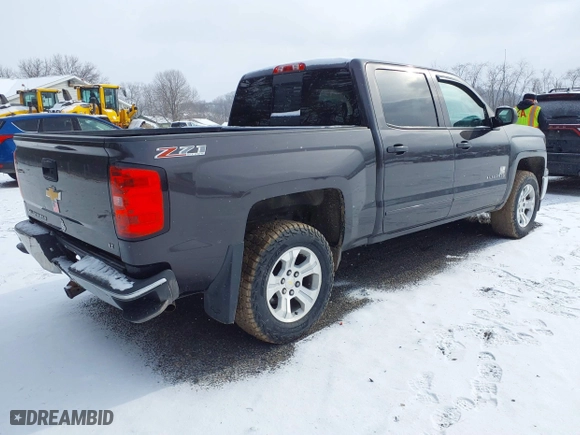 2015 Chevrolet Silverado 1500 LT with VIN 3GCUKREC3FG460485, listed as a IAAI auction lot 41616998 with 128,049 mi miles. Bid and sale history available at carsss.com. Image 4.