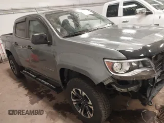 2022 Chevrolet Colorado 4WD Z71 z VIN 1GCGTDEN6N1169037, wystawiony jako IAAI lot #40987020 z przebiegiem 25 189 mil mil oraz . Historia ofert i sprzedaży dostępna na DreamBid. Obrazek 1.