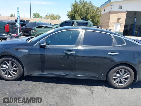 2020 Kia Optima LX with VIN 5XXGT4L32LG420025, listed as a IAAI auction lot 42288132 with 69,729 mi miles and . Bid and sale history available at DreamBid. Image 14.