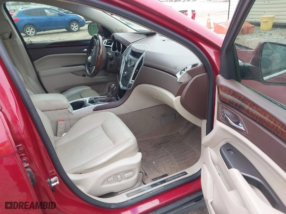 2012 Cadillac SRX Performance Collection with VIN 3GYFNBE36CS527333, listed as a IAAI auction lot 41910224 with 144,446 mi miles. Bid and sale history available at carsss.com. Image 5.