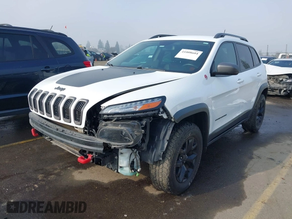2018 Jeep Cherokee Trailhawk z VIN 1C4PJMBX8JD525945, wystawiony jako IAAI lot #41008604 z przebiegiem 111 086 mil mil oraz . Historia ofert i sprzedaży dostępna na DreamBid. Obrazek 21.