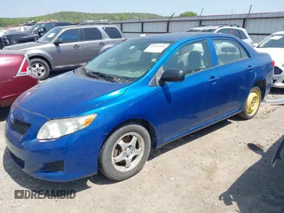 2009 Toyota Corolla with VIN JTDBL40E799044489, listed as a IAAI auction lot 42053660 with 186,356 mi miles. Bid and sale history available at carsss.com. Image 2.
