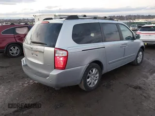2007 Kia Sedona LX with VIN KNDMB233976172127, listed as a IAAI auction lot 41557356 with 164,383 mi miles. Bid and sale history available at carsss.com. Image 4.