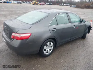 2007 Toyota Camry CE with VIN 4T1BE46K77U688152, listed as a IAAI auction lot 41799406 with 152,033 mi miles. Bid and sale history available at carsss.com. Image 4.