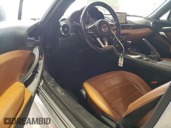 2019 FIAT 124 Spider Urbana Edition z VIN JC1NFAEK3K0141858, wystawiony jako Copart lot #59643304 z przebiegiem 120 343 mil mil oraz Szkoda całkowita • Salvage title. Historia ofert i sprzedaży dostępna na DreamBid. Obrazek 8.