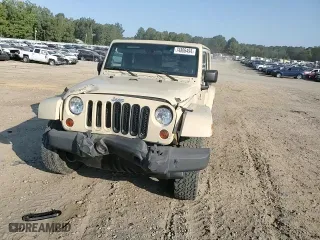 2011 Jeep Wrangler Unlimited Sahara with VIN 1J4BA5H10BL558961, listed as a Copart auction lot 74806494 with 172,855 mi miles and Salvage Title. Bid and sale history available at carsss.com. Image 12.