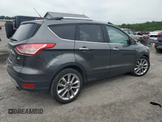 2016 Ford Escape SE z VIN 1FMCU9G95GUC33848, wystawiony jako Copart lot #58191925 z przebiegiem 108 194 mil mil oraz Szkoda całkowita • Salvage title. Historia ofert i sprzedaży dostępna na DreamBid. Obrazek 3.