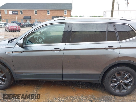 2023 Volkswagen Tiguan SE with VIN 3VVNB7AX4PM042409, listed as a IAAI auction lot 42627800 with 29,016 mi miles and . Bid and sale history available at DreamBid. Image 14.