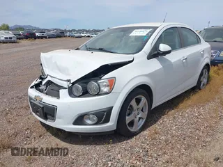 2014 Chevrolet Sonic LTZ with VIN 1G1JE5SB4E4227749, listed as a IAAI auction lot 38965556 with 69,550 mi miles. Bid and sale history available at carsss.com. Image 2.