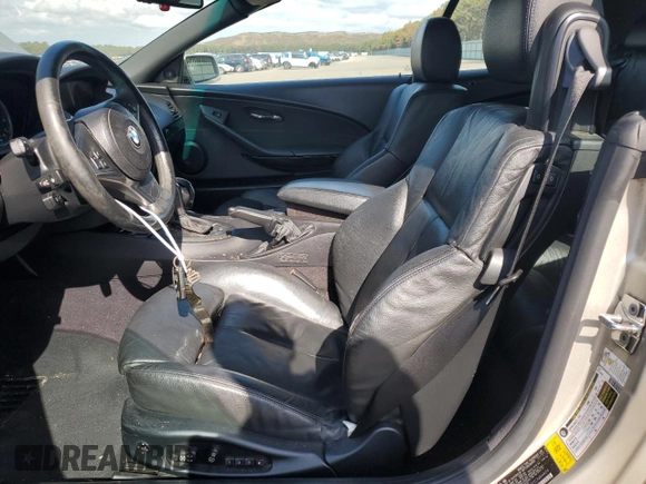 2007 BMW 6 Series 650i with VIN WBAEK13507CN84404, listed as a Copart auction lot 73525244 with 156,497 mi miles and Salvage Title. Bid and sale history available at DreamBid. Image 7.