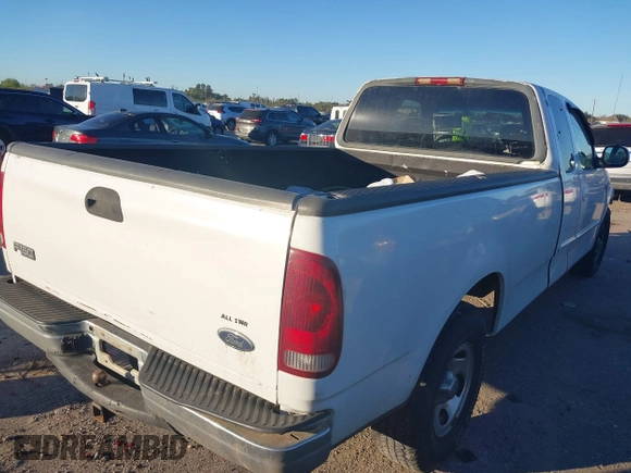 2001 Ford F-150 XL с VIN 1FTRX17W61KF65488, выставлен на аукционе IAAI как лот 40807535 с пробегом 298 274 миль миль и . История ставок и продаж доступна на DreamBid. Изображение 4.