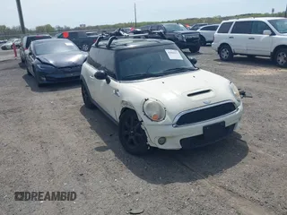 2007 MINI Hardtop S with VIN WMWMF73547TV31403, listed as a IAAI auction lot 42066433 with 156,730 mi miles and . Bid and sale history available at DreamBid. Image 1.