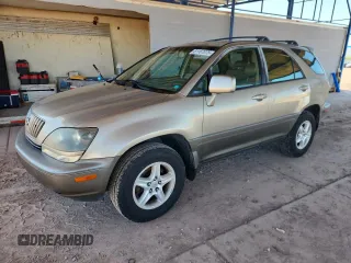 2000 Lexus RX 300 z VIN JT6HF10U0Y0145858, wystawiony jako Copart lot #61167075 z przebiegiem 176 573 mil mil oraz Czysty tytuł • Clean title. Historia ofert i sprzedaży dostępna na DreamBid. Obrazek 1.