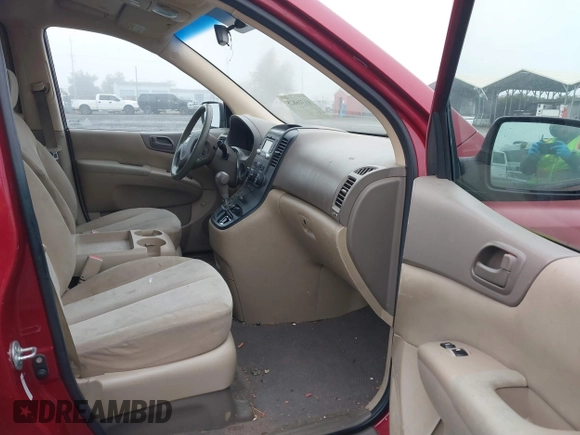 2011 Kia Sedona LX with VIN KNDMG4C71B6411453, listed as a IAAI auction lot 41316825 with 261,028 mi miles. Bid and sale history available at carsss.com. Image 5.