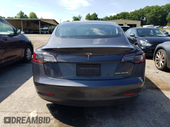 2022 Tesla Model 3 Long Range with VIN 5YJ3E1EB5NF105785, listed as a Copart auction lot 61304654 with 37,306 mi miles and Salvage Title. Bid and sale history available at DreamBid. Image 6.