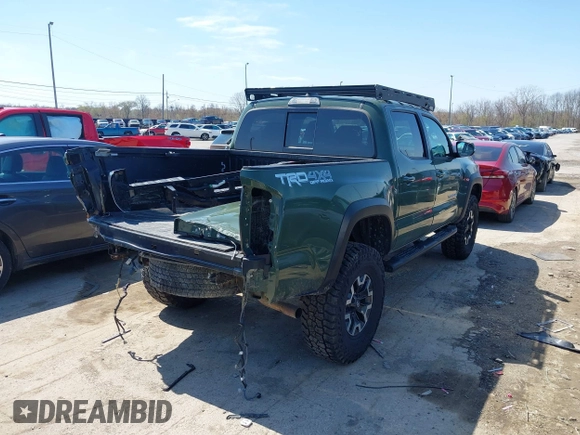 2021 Toyota Tacoma 4WD SR with VIN 3TMCZ5ANXMM382874, listed as a IAAI auction lot 41965388 with 62,178 mi miles. Bid and sale history available at carsss.com. Image 4.