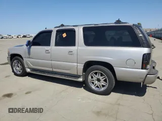 2006 GMC Yukon XL with VIN 1GKFK66U36J134459, listed as a Copart auction lot 55802165 with 277,366 mi miles and Salvage title. Bid and sale history available at DreamBid. Image 2.