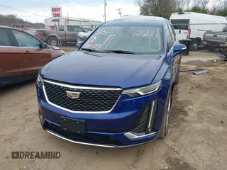 2023 Cadillac XT6 AWD Premium Luxury with VIN 1GYKPDRS2PZ126666, listed as a IAAI auction lot 40963833 with 23,535 mi miles and . Bid and sale history available at DreamBid. Image 18.