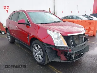2012 Cadillac SRX Performance Collection with VIN 3GYFNEE35CS613489, listed as a IAAI auction lot 41796255 with 71,331 mi miles. Bid and sale history available at carsss.com. Image 1.