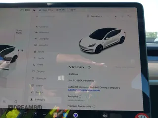 2023 Tesla Model 3 with VIN 5YJ3E1EA3PF617460, listed as a IAAI auction lot 42154401 with 9,578 mi miles and . Bid and sale history available at DreamBid. Image 7.
