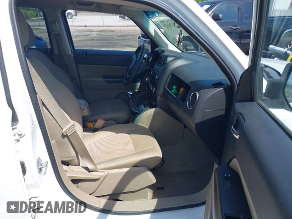 2014 Jeep Patriot Sport with VIN 1C4NJPBB3ED618570, listed as a IAAI auction lot 42126639 with 157,005 mi miles and . Bid and sale history available at DreamBid. Image 5.