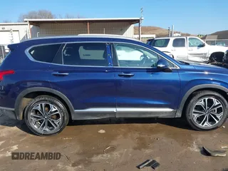 2019 Hyundai Santa Fe Ultimate with VIN 5NMS5CAA6KH117104, listed as a IAAI auction lot 41639157 with 75,507 mi miles and . Bid and sale history available at DreamBid. Image 13.