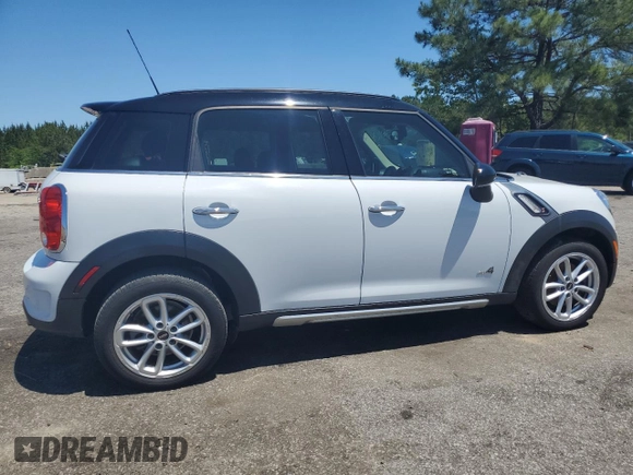 2016 MINI Countryman S with VIN WMWZC5C51GWU00690, listed as a Copart auction lot 55077095 with 104,176 mi miles and Salvage title. Bid and sale history available at DreamBid. Image 3.