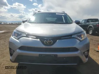 2018 Toyota RAV4 XLE with VIN 2T3RFREV2JW699448, listed as a Copart auction lot 55345975 with 46,437 mi miles and Salvage Title. Bid and sale history available at DreamBid. Image 5.