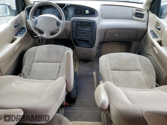 2000 Ford Windstar SE с VIN 2FMZA5249YBC34841, выставлен на аукционе Copart как лот 72383304 с пробегом Не указан миль и Списание • Salvage title. История ставок и продаж доступна на DreamBid. Изображение 8.