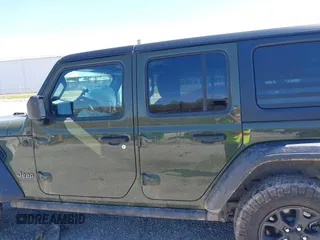 2021 Jeep Wrangler Unlimited Sport S with VIN 1C4HJXDG5MW804748, listed as a IAAI auction lot 41878895 with 35,839 mi miles and . Bid and sale history available at DreamBid. Image 14.
